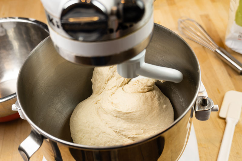 Mixing dough pretzel rolls