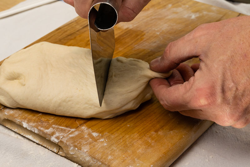 Portioning dough for pretzel buns