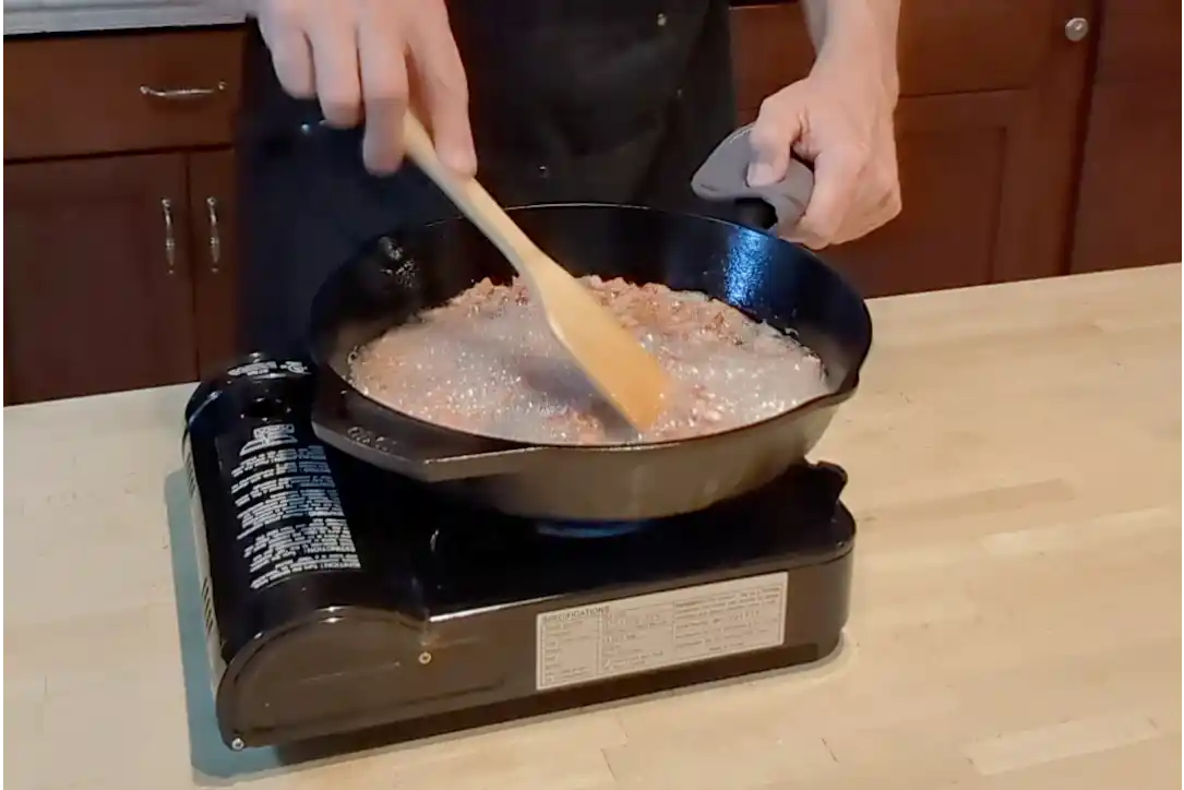 Cooking bacon in a cast iron skillet