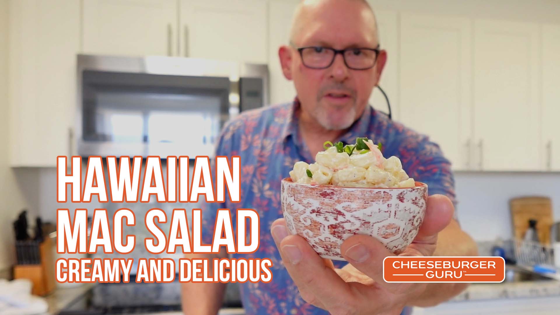 Cheeseburger Guru holding a bowl of authentic Hawaiian Mac Salad